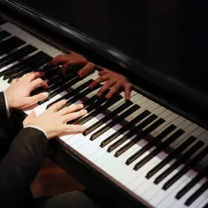 Pianist performing on black and white keys