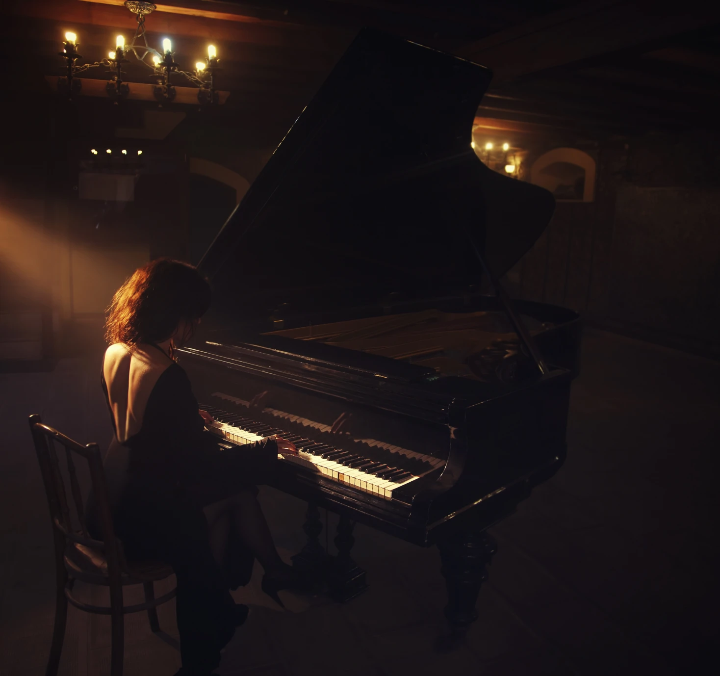 Pianist in softly lit setting